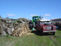  using the tractor circular saw to chop up some smaller stuff